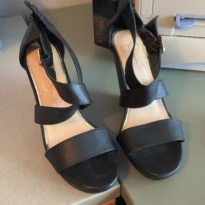 Jessica Simpson black wedge shoes. wedge is about 4” high at the highest point.